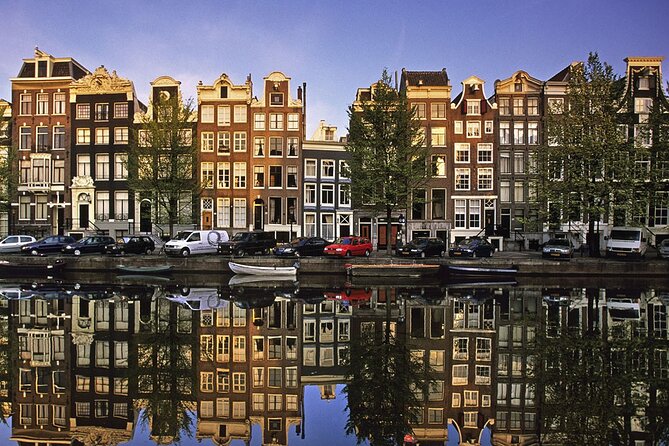 5 hrs Golden Age Amsterdam Private Walking Tour With Local Guide - Starting at Centraal Station, the “wooden poles” story