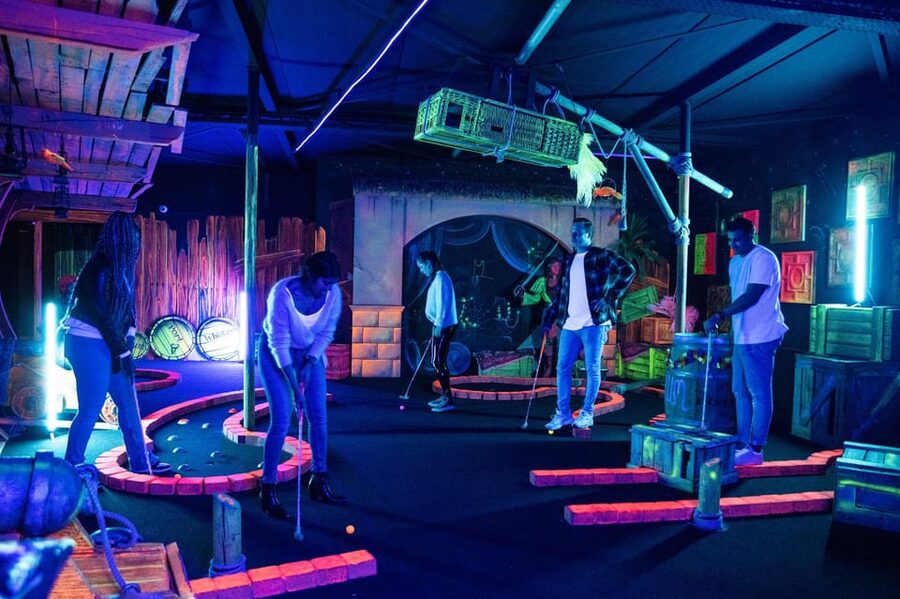 Aloha Amsterdam: 12-Hole Glow-in-the-Dark Mini-Golf - Drinks, snacks, and extra games in the same complex