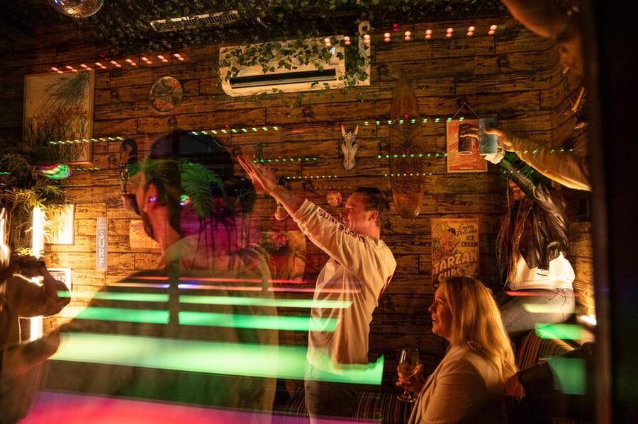 Aloha Amsterdam: Private Karaoke Booth with 20.000 Songs - Solo, duet, and group dynamics in a private room