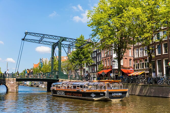 Amsterdam 1h Canal Cruise by Semi-Open Boat with Audio Guide - Arriving, boarding, and the one-minute mistake that costs you time