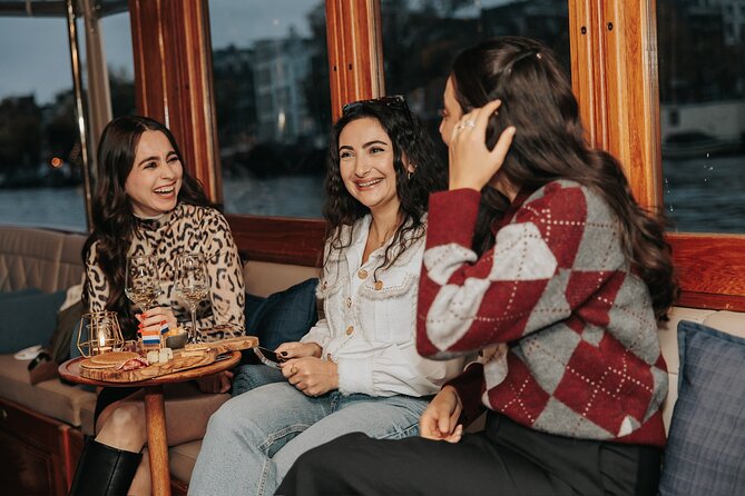 Amsterdam: 2-Hour Canal Cruise incl. Drinks & Dutch Snacks - Bartolotti house, De Negen Straatjes, and how neighborhoods read from the water