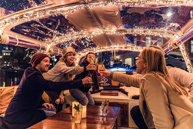 Amsterdam 2-Hour Evening Cruise With Live Guide and Bar - Stop-by-stop: the route that mixes famous sights with quieter canal mood
