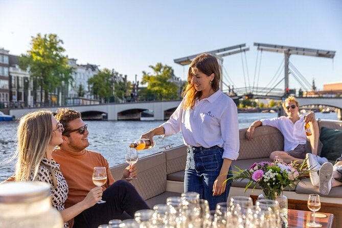 Amsterdam 2 Hour Small-Group Canal Cruise with Dutch Snacks & Bar - The 2-hour route: classic UNESCO canal sights plus the city’s modern edges