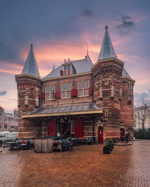 Amsterdam: 3-Course Typical Dutch Menu at In de Waag - Entering the Waag, a city gate turned candlelit dinner hall