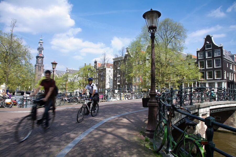 Amsterdam: 3-Hour Private Bike Tour of the City Center - Dam Square to the Westerkerk: city landmarks with street-level context