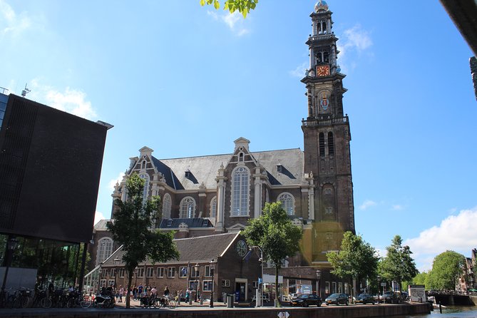 Amsterdam 3 hrs Bike Tour – live guide En/Fr/De/Nl/Sp - Muziekgebouw aan t IJ: a scenic breather by the IJ River