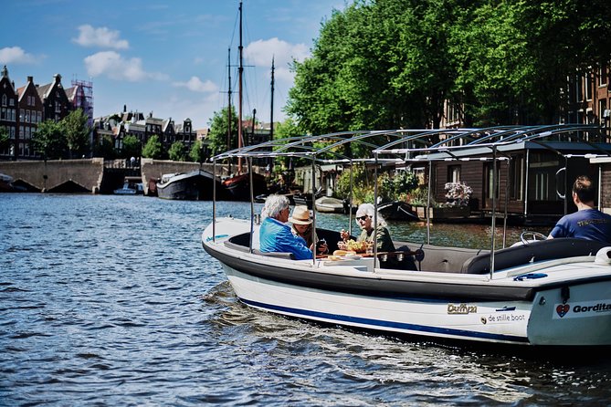 Amsterdam: 60-Minute Guided Private Canal Cruise with Drinks - The Canal Belt and UNESCO Stories From the Water
