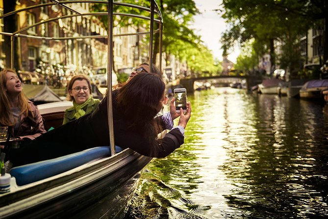 Amsterdam 90-min Private Canal Cruise with Live Guide and Drinks - Key highlights you will feel right away