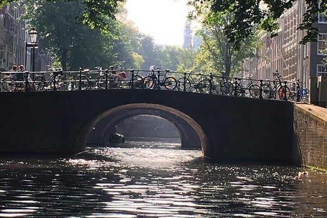 Amsterdam 90-min Private Canal Cruise with Live Guide and Drinks - Drinks included: Prosecco, beer, and how to plan for the only food gap