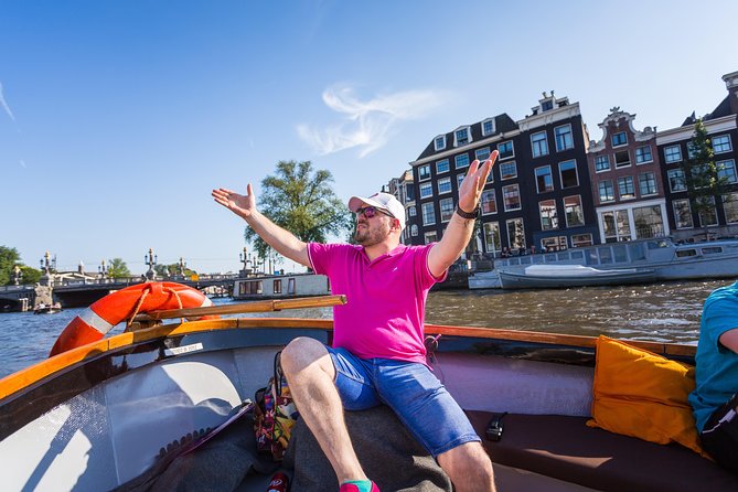 Amsterdam All-Inclusive 90-Minutes Heated Cruise by Captain Jack - Amstel River section: Carré, Hermitage Amsterdam, Stopera, Zuiderkerk, and classic bridge views