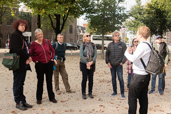 Amsterdam: Anne Frank and Jewish Quarter Walking Tour (TOP RATED) - Dam Square and the Royal Palace walk: a practical sightseeing payoff