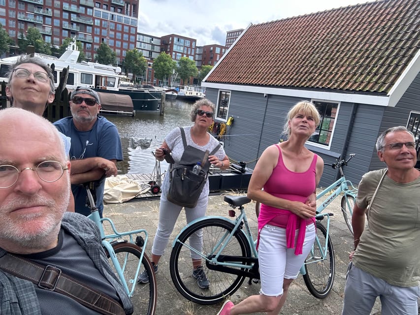 Amsterdam: Architektur Er-fahren - Meeting at Beursplein/Damrak, then cycling the IJ to Amsterdam Central