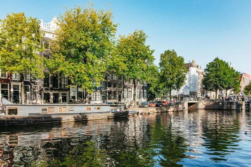 Amsterdam Bike Tour in Small Group + Optional Canal Cruise - Magere Brug: the bridge stop that makes the canal scenes click