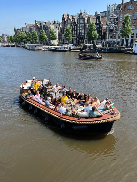 Amsterdam: Boat Tour with Optional Unlimited Drinks - The Night Route: Oude Kerk, the Attic Museum, and Rembrandt House
