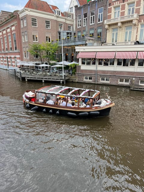 Amsterdam: Boat Tour with Optional Unlimited Drinks - Open Deck or Glass Roof: How to Pick Your Spot Comfortably