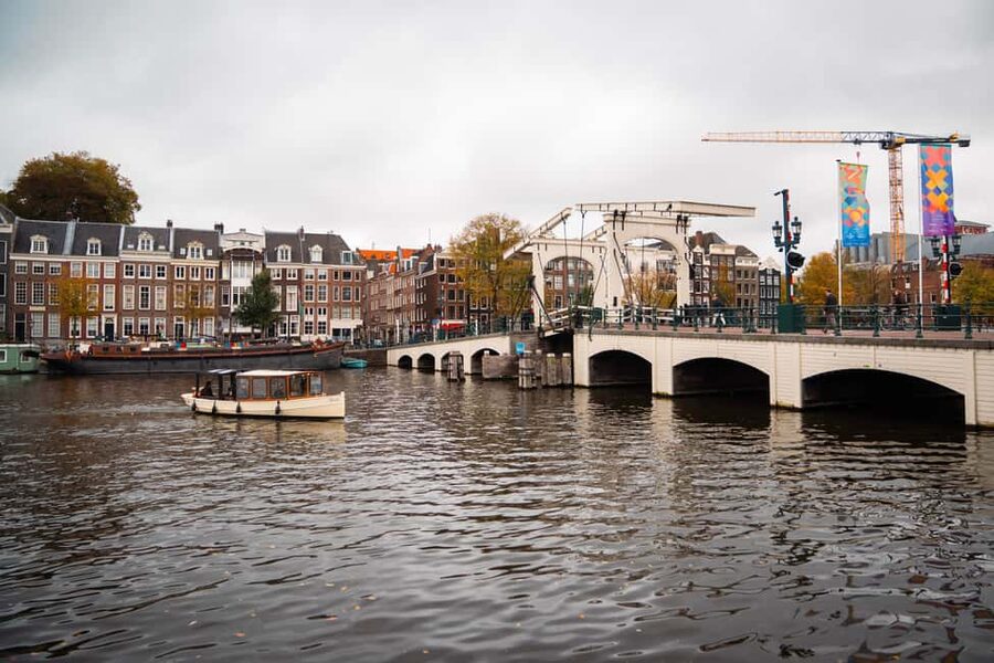 Amsterdam Canal Boat Tour with Live Guide - Your live guide: English, Russian, Ukrainian, and a more human vibe