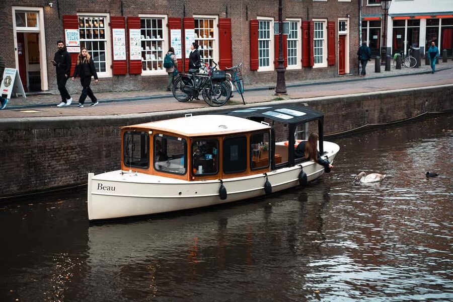 Amsterdam Canal Boat Tour with Live Guide - Price and value: what you get for about $22 per person