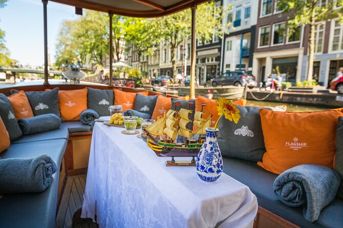 Amsterdam Canal Cruise in Classic Salon Boat With Drinks and Cheese - Your 1-hour ride: quick overview, real canal views