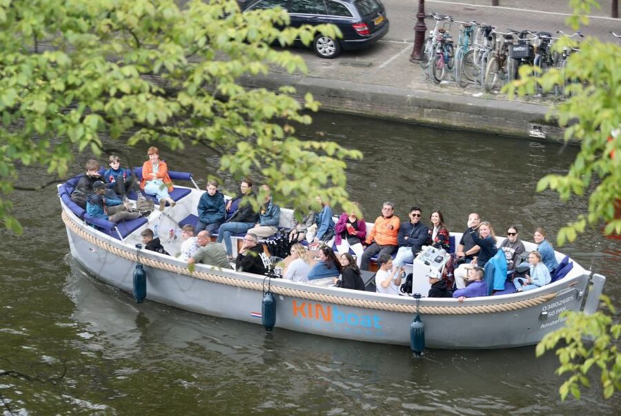 Amsterdam: Canal Cruise in Open Boat with Drink Option - What groups will love, and who should choose differently