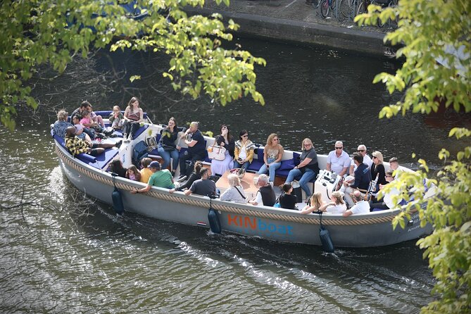 Amsterdam Canal Cruise in Open Boat with Unlimited Drinks Option - What the Cruise Covers: UNESCO Canals, Photo Stops, and Big-Sight Views