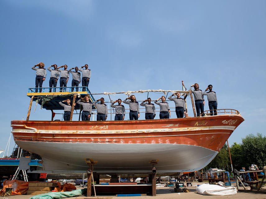 Amsterdam: Canal Cruise on a Wooden Refugee Boat - Getting on the wooden boat: what the ride feels like