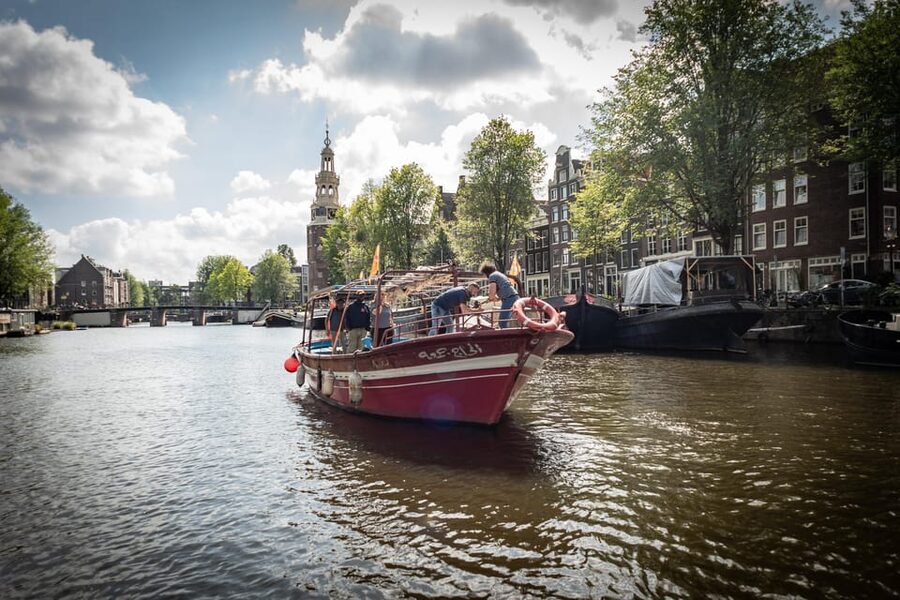 Amsterdam: Canal Cruise on a Wooden Refugee Boat - The human core: guides with refugee backgrounds and space for real questions