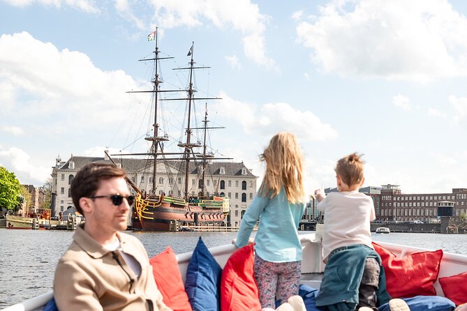 Amsterdam Canal Cruise with Live Guide and Two Drinks - Drinks included: small perk, real value on a 1-hour trip