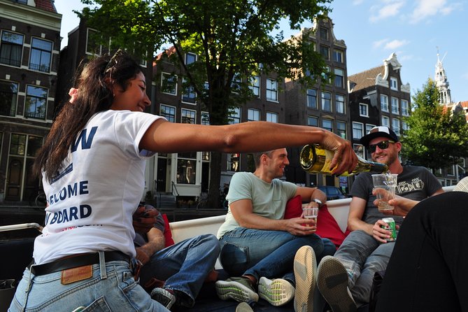 Amsterdam Canal Cruise With Live Guide and Unlimited Drinks - Live English Guide Storytelling, Plus How to Get the Most Out of It