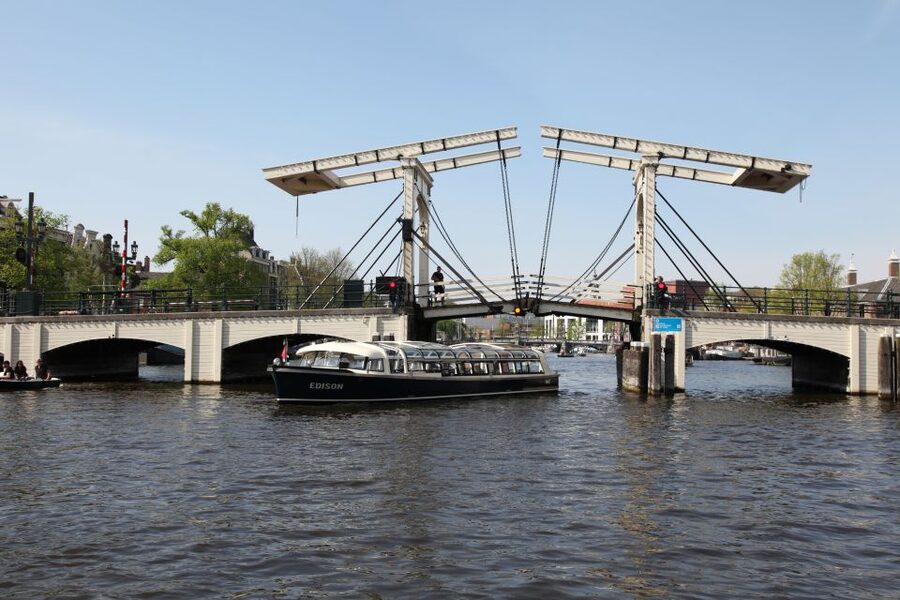 Amsterdam: City Canal Cruise & Straat Museum - The 75-Minute Blue Boat Cruise: Views, Photo Stops, and Audio