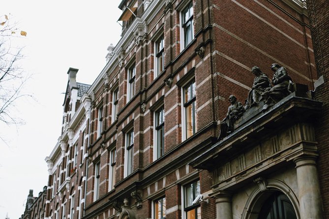 Amsterdam City Center Guided Walking Tour Semi-Private 12ppl Max - Nieuwmarkt to the Waag: a market square with trade in its DNA