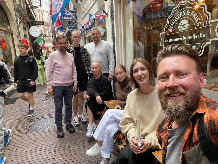Amsterdam: City Highlights Walking Tour - Damrak Stroll: Where Shops and Culture Share the Same Side Streets