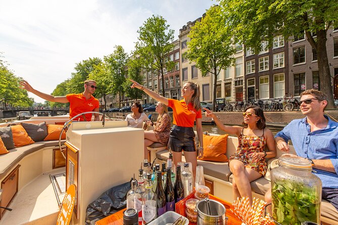 Amsterdam Classic Saloon Boat Canal Cruise with Live Guide - The Southern Church and the Stopera, where old and civic collide