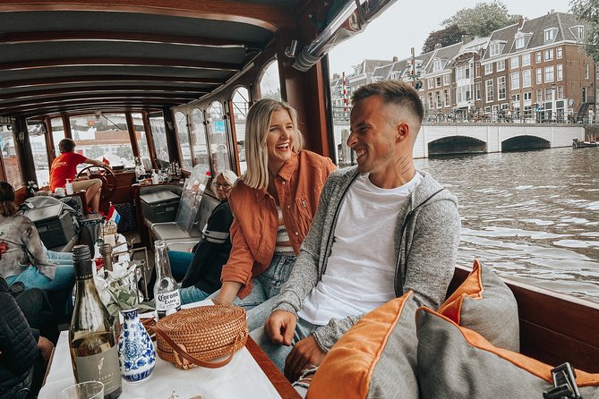 Amsterdam Classic Saloon Boat Cruise with Drinks and Cheese - Moving Through Bloemgracht, Amstel, and the Canal Belt Links