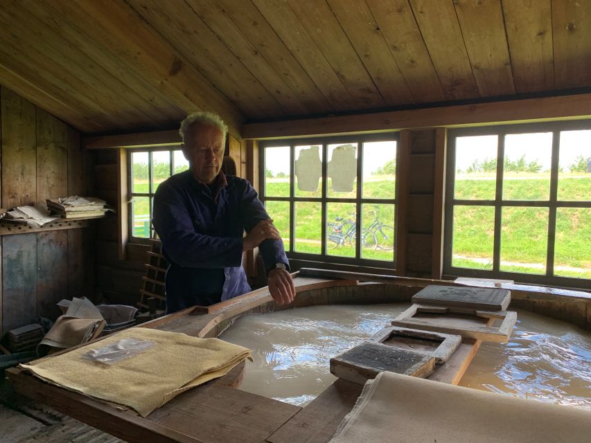 Amsterdam: Countryside Bike Tour and Zaanse Schans Windmills - Sawmill stop and 17th-century paper tied to the US Declaration