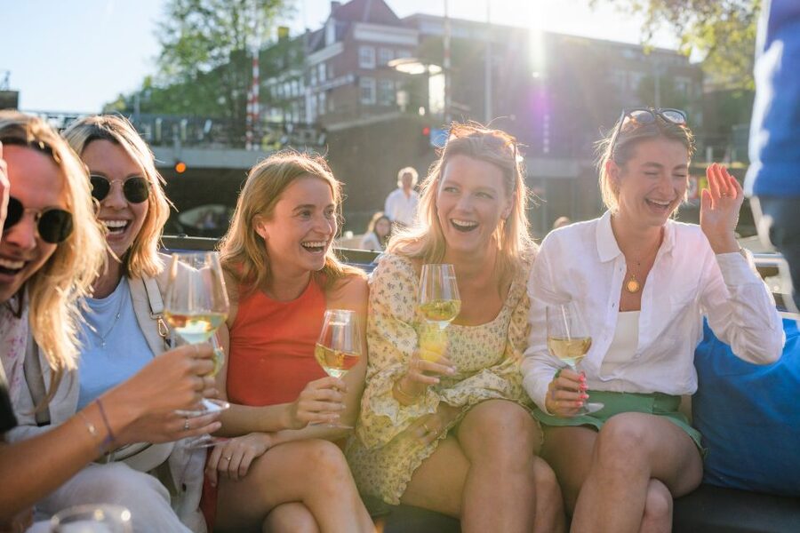 Amsterdam: Covered Canal Booze Cruise with Unlimited Drinks - Meeting points in the city center: choose based on your vibe