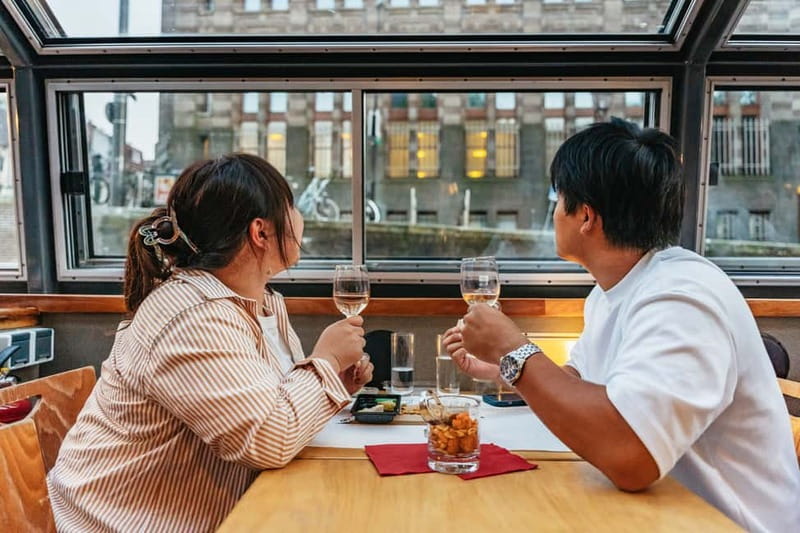 Amsterdam: Cozy Cheese & Wine Cruise Tasting Experience - Anne Frank House viewpoint and the Skinny Bridge moment you’ll remember