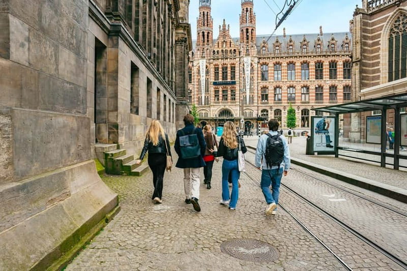 Amsterdam: Cultural Highlights Walking Tour - Torensluis Bridge, the Multatuli Statue, and the Tiny House Detail