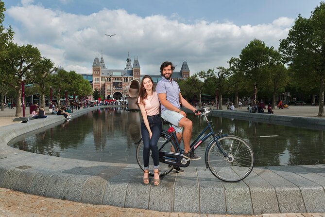 Amsterdam: E-Bike Sightseeing Tour - Entering Amsterdam fast: why the e-bike format works