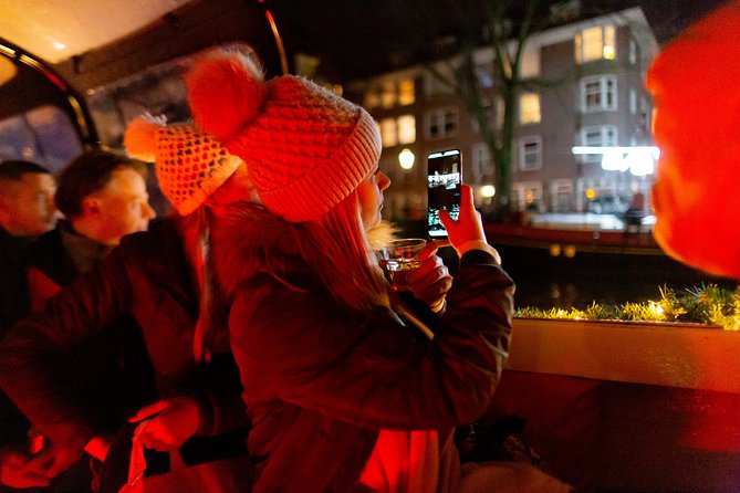 Amsterdam Evening Canal Cruise with Live Guide and Onboard Bar - Prinsengracht and the UNESCO ring at night