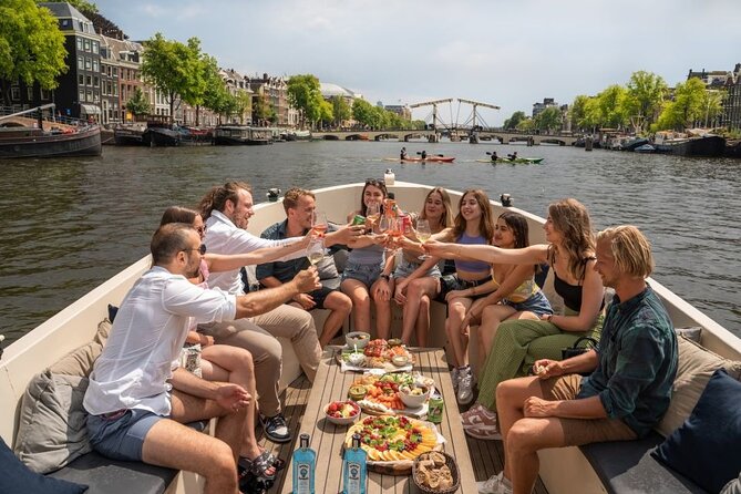 Amsterdam: Evening Candle Light Cruise With Wine & Cheese - Getting on board at Oudezijds Voorburgwal, and what to confirm