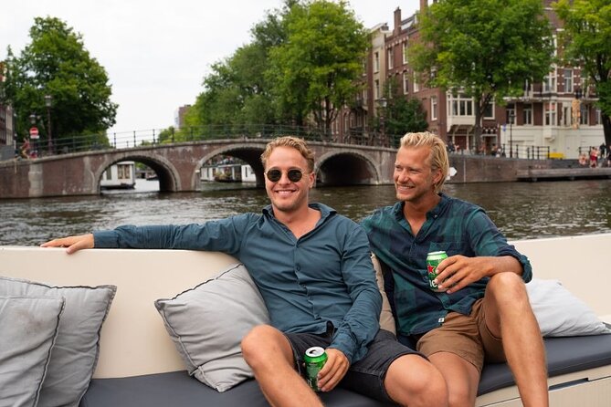 Amsterdam: Evening Candle Light Cruise With Wine & Cheese - Jordaan’s Seven Bridges and Magere Brug, the Skinny Bridge moment