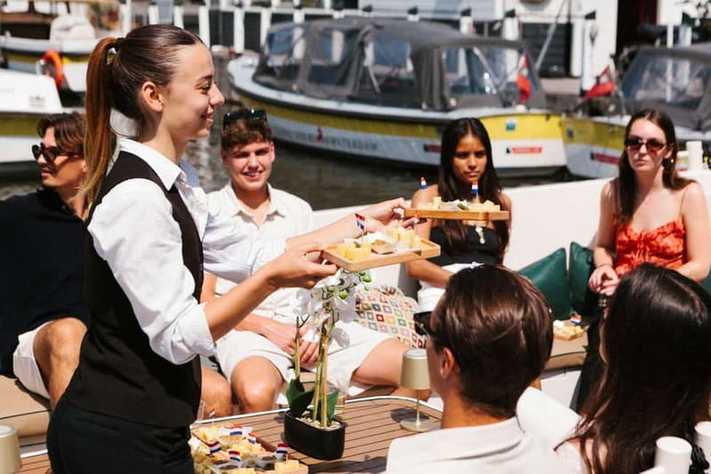 Amsterdam Evening (Sunset) Canal Cruise w/ optional drinks - Guides and Storytelling: English Commentary Plus an 8-Language Digital Booklet