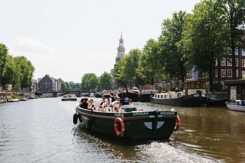 Amsterdam Evening (Sunset) Canal Cruise w/ optional drinks - Boat Comfort in Real Amsterdam Weather