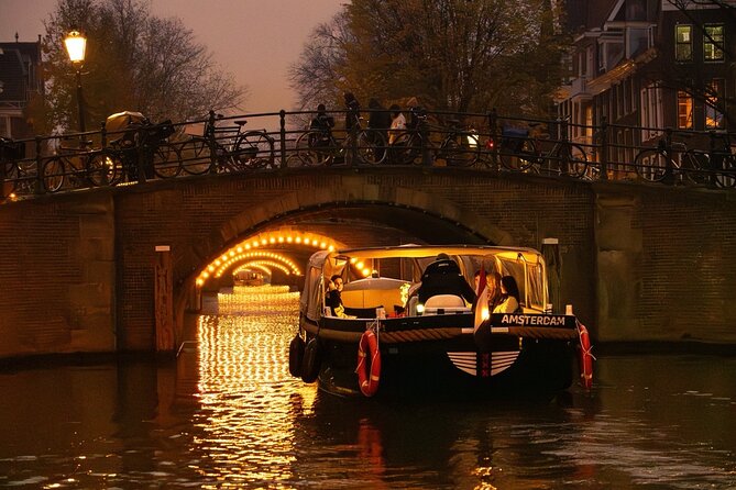 Amsterdam Evening (Sunset) Canal Cruise with optional drinks - Open-boat comfort, rain gear, and how to stay warm