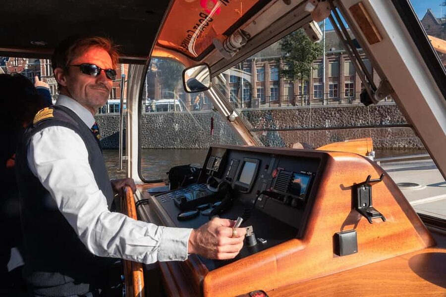 Amsterdam: Fly High with This is Holland & Sail the Canals - Live captain commentary, with multiple language options