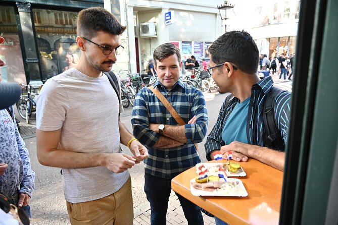 Amsterdam Food Tour with Full Meal & Drinks by Do Eat Better - Spui: fries, sauce, and fresh herring