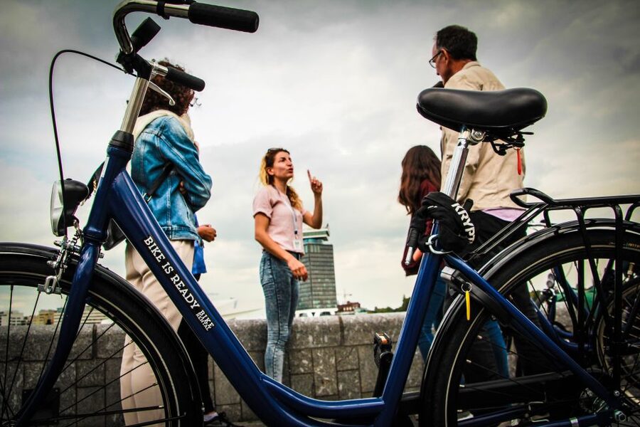 Amsterdam full day tour: Walking, Biking & Cruising - Starting at Beursplein and Getting Oriented on Foot