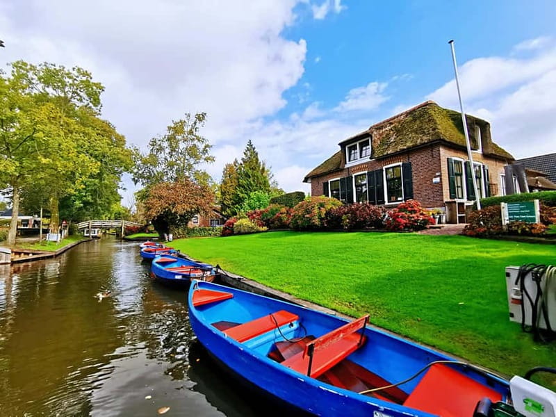 Amsterdam: Giethoorn, Afsluitdijk and Zaanse Schans Day Trip - Zaanse Schans in Zaandam: windmills, wooden houses, cheese, and clogs