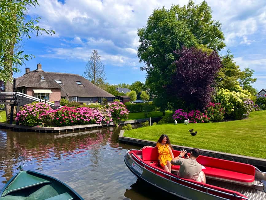 Amsterdam: Giethoorn Day Trip, with several guided options - Canal Cruise in Giethoorn: Wooden Bridges, Thatched Roofs, and Skipper Stories