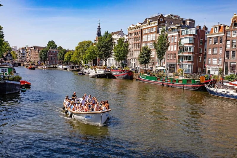 Amsterdam: Guided City Highlights Open Boat Canal Cruise - What the captain’s narration does for the trip